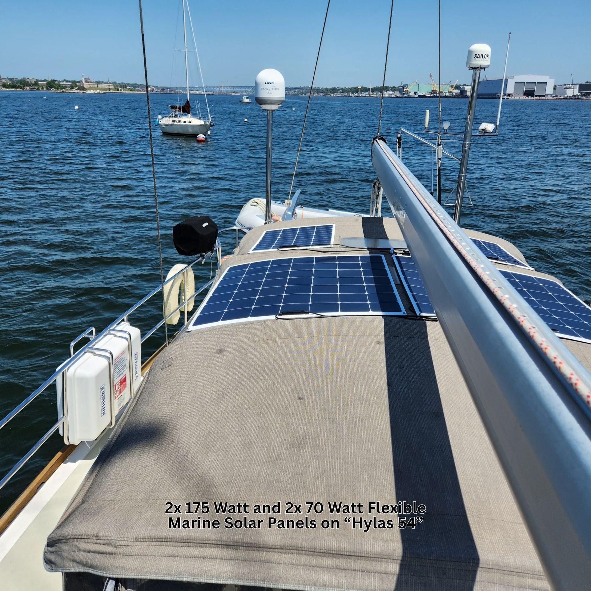 2x 175 Watt and 2x70 Watt Flexible Marine Solar Panels on Hylas 54 sailboat bimini