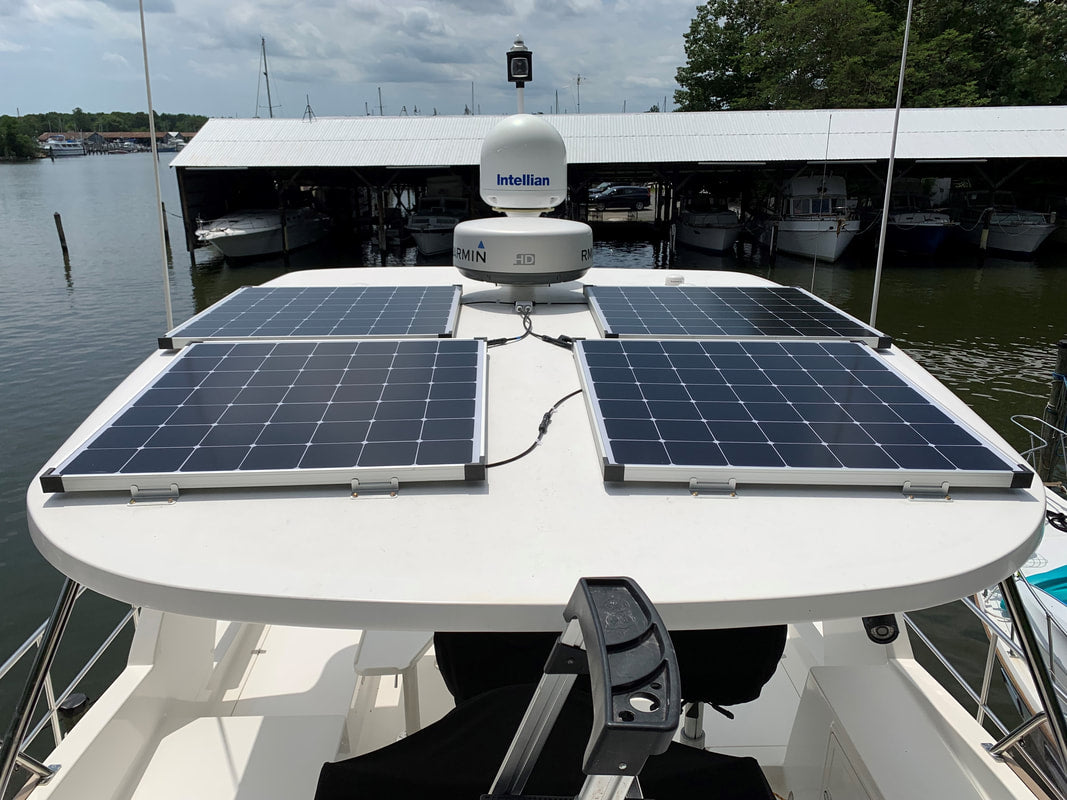 Four 175 Watt Rigid Marine Solar Panels on Sailboat