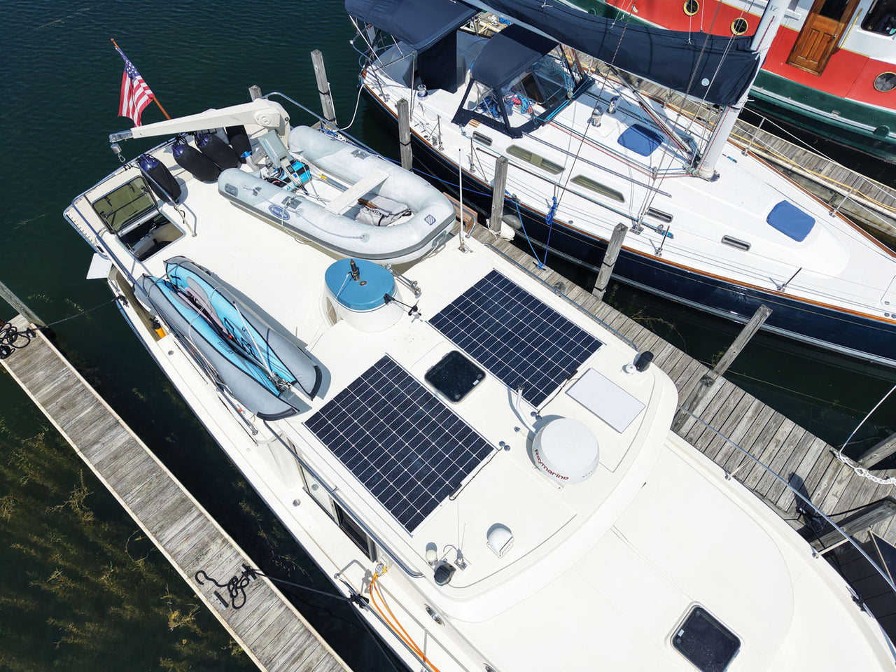 Two 325W walkable solar panels on a Nordig Tug boat "TugAlong"