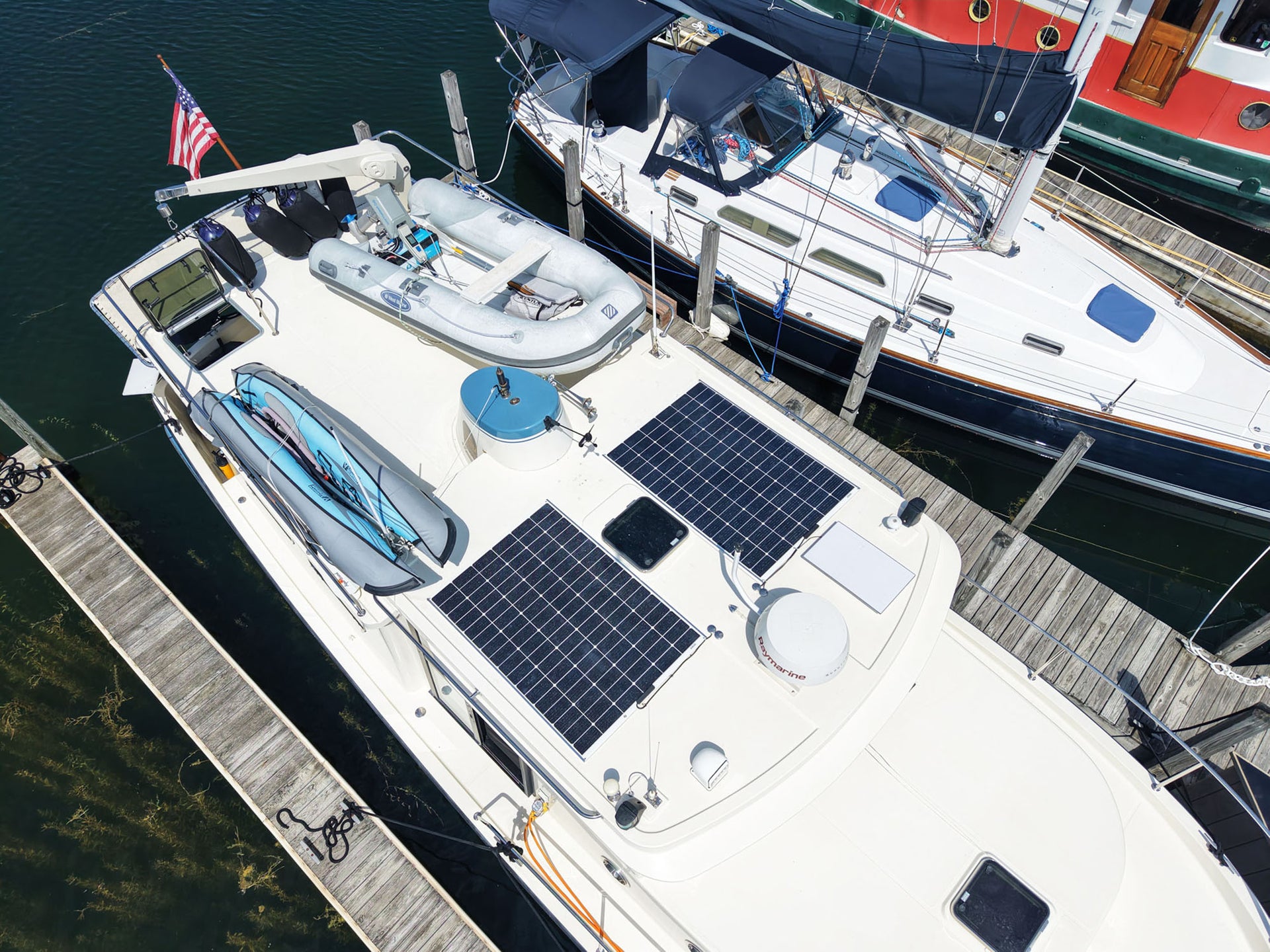 Two 325W walkable solar panels on a Nordig Tug boat "TugAlong"