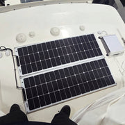 Two 100 watt walkable solar panels installed on  a Boston Whaler