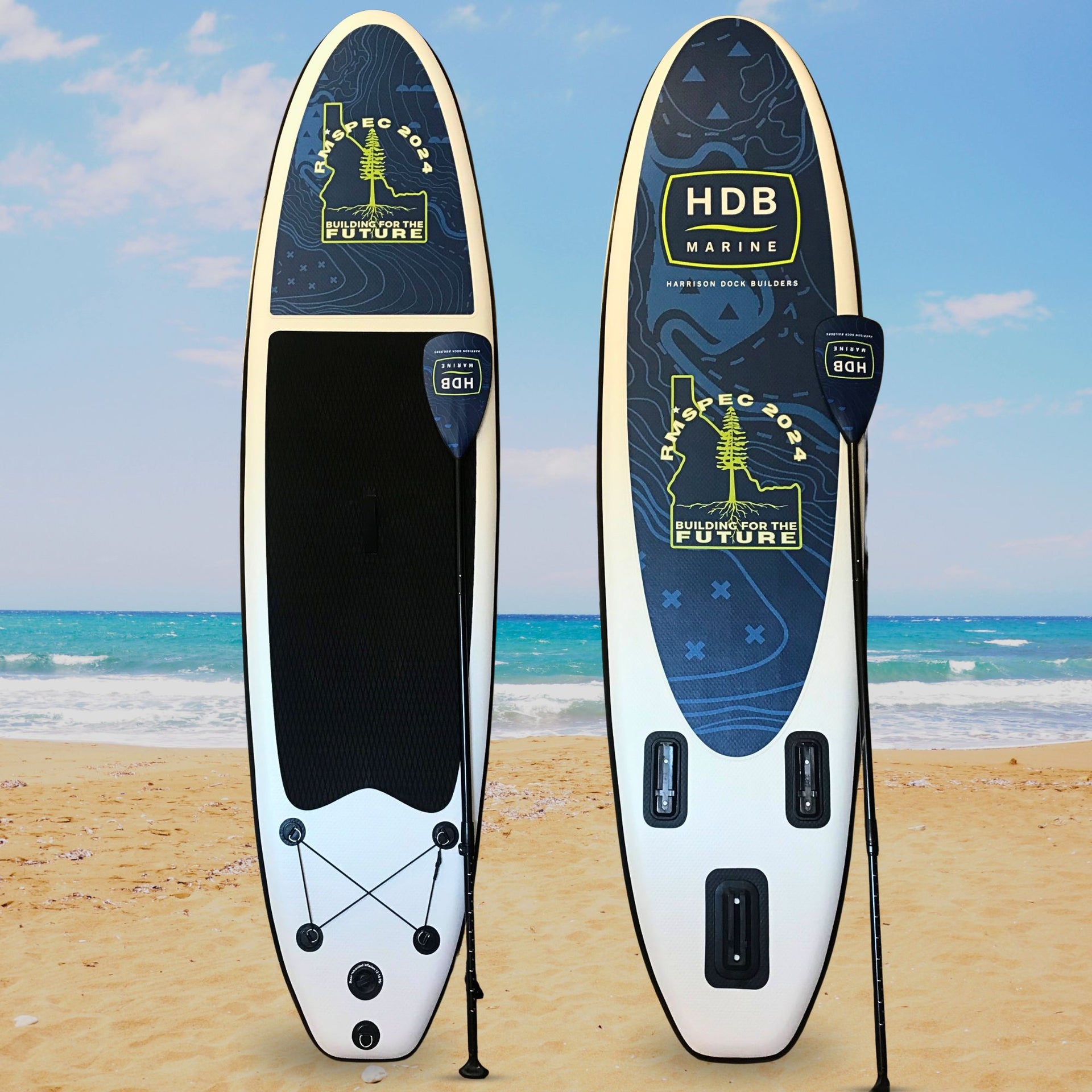 Custom branded inflatable SUP with nose and bottom graphics, including matching paddle