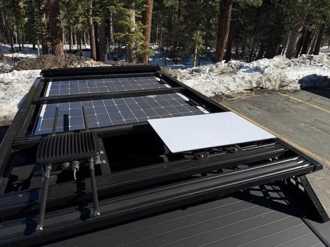 Tesla Cybertruck with walkable solar panels installed on roof rack for Starlink and outdoor router power