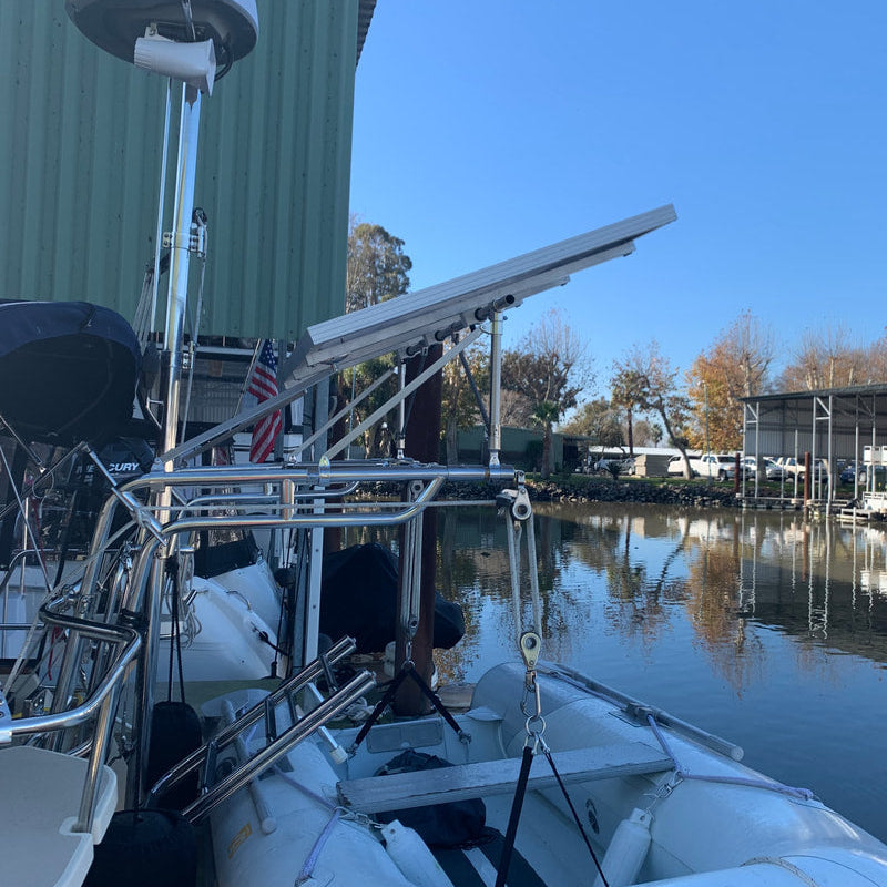 davit mounted rigid marine solar panels on sailboat