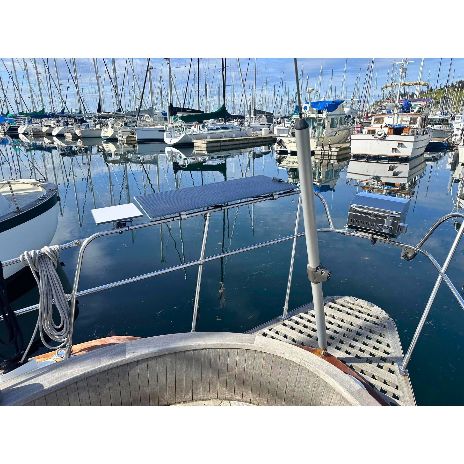 Rail mounted marine solar panel with aluminum sliding bracets