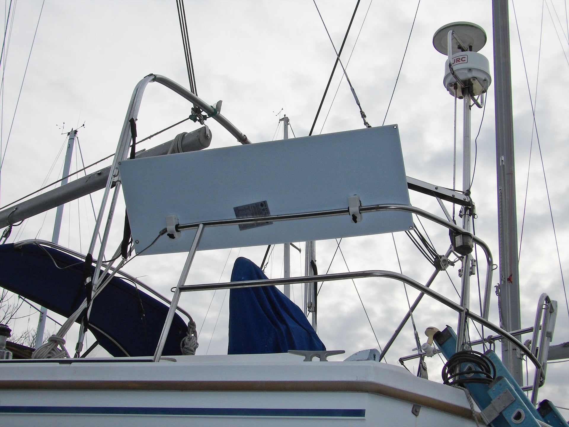 Rail mounted marine solar panel with seadog brackets