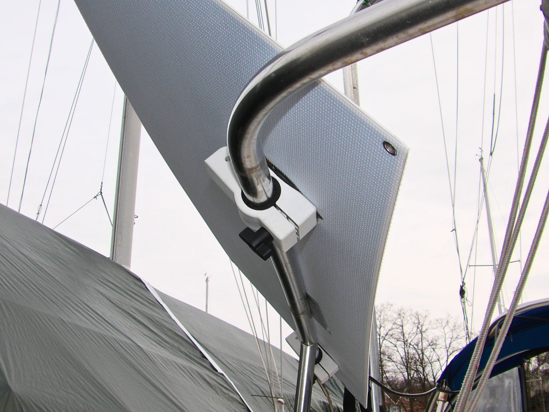 Rail mounted marine solar panel with seadog clamps